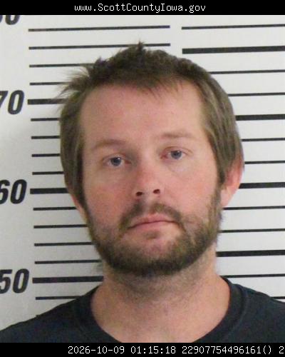 Booking photo — Adam Michael Delong