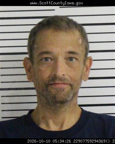 Booking photo — Reid William Pettifer